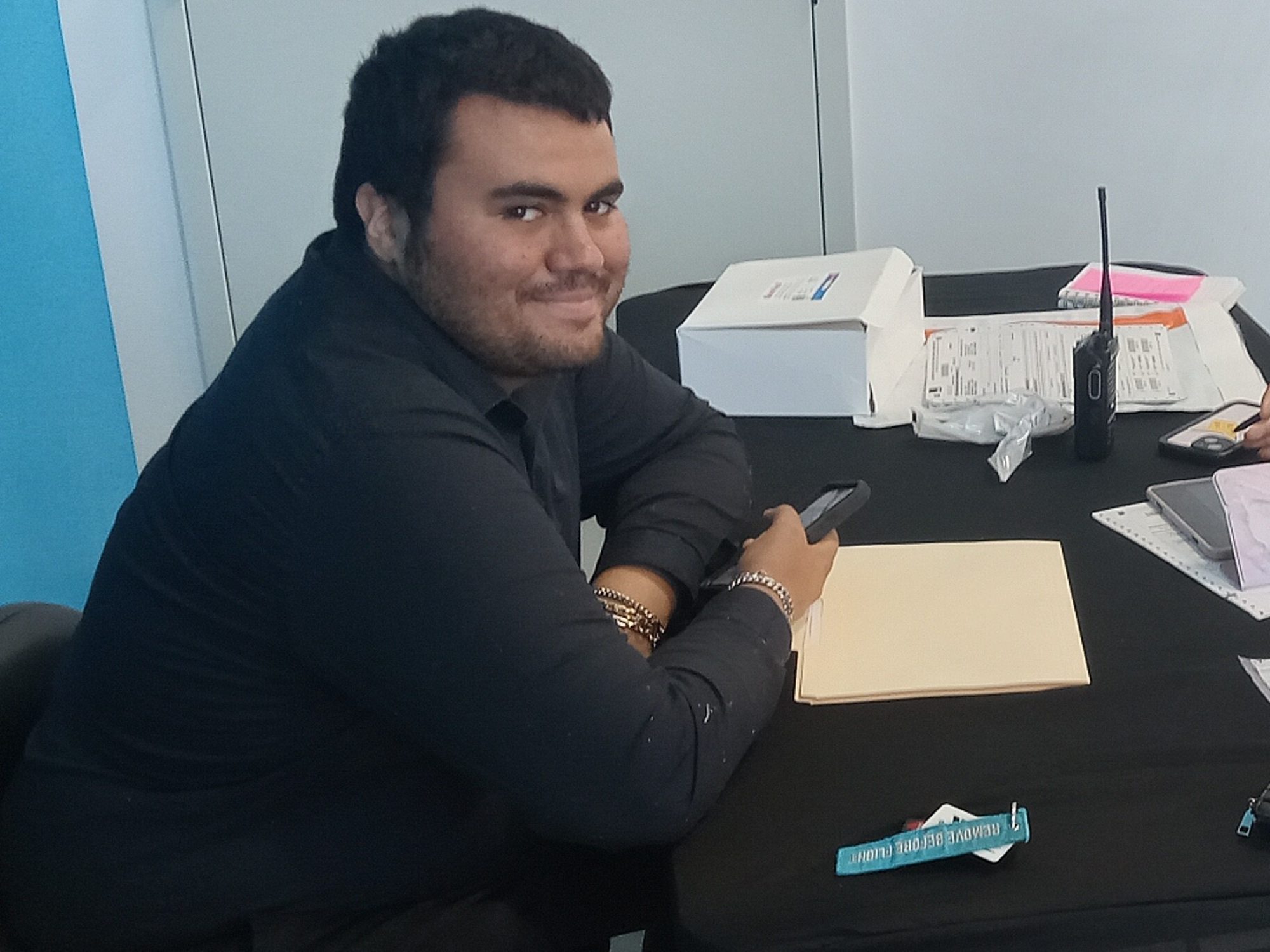 A Venture Community Services employee at a desk during a workplace training session