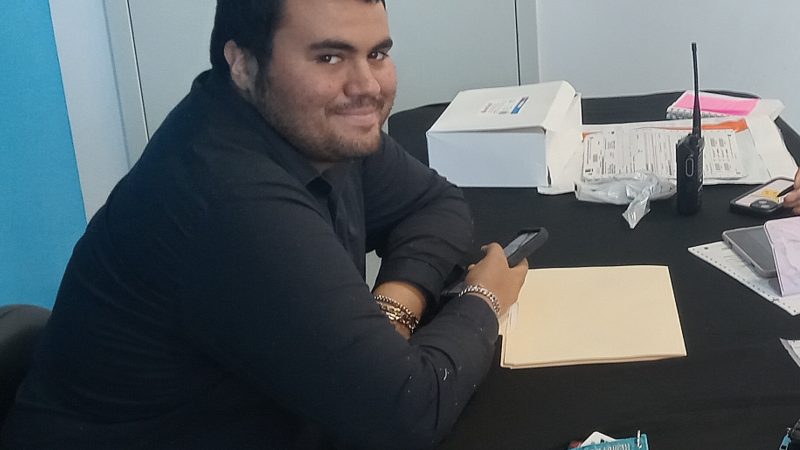 A Venture Community Services employee at a desk during a workplace training session